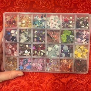 Container filled with charms
